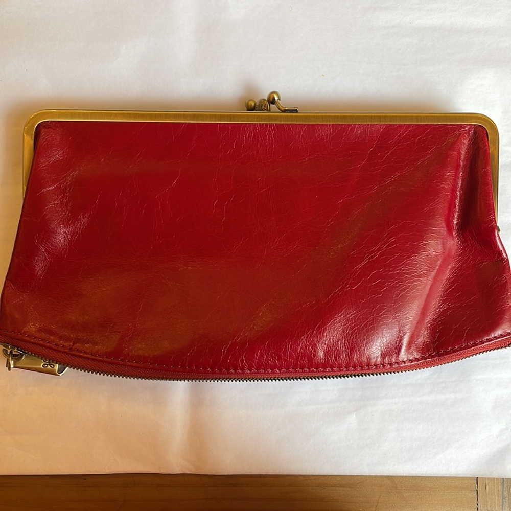 NWOT!    HOBO clutch with card slots/wallet features.   Red leather.